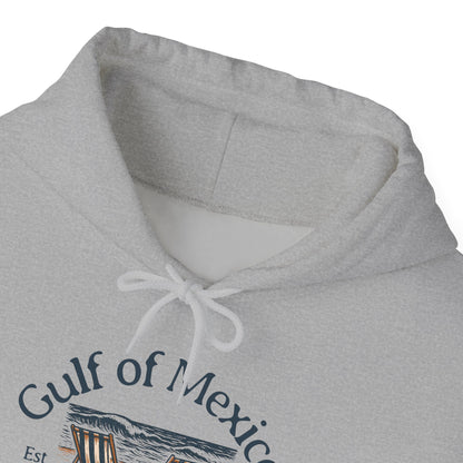 Close up of gray hoodie with 'Gulf of Mexico' text and beach graphic on a white background