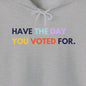 "Have the day you voted for" Gray hoodie with colorful text on a white background